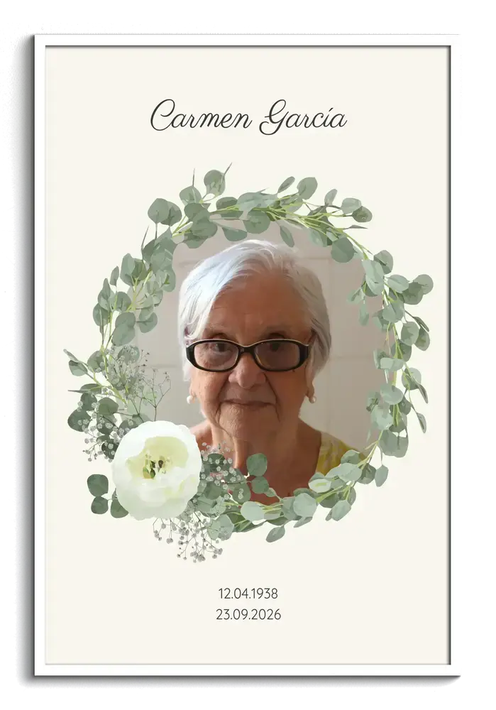 Cuadro conmemorativo personalizado con retrato, corona de eucalipto y flores blancas en marco blanco